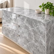 Céladon — nuance 14, adhésif décoratif appliqué sur commode